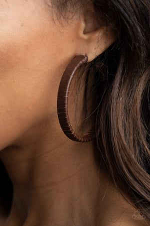 Leather-Clad Legend - Brown